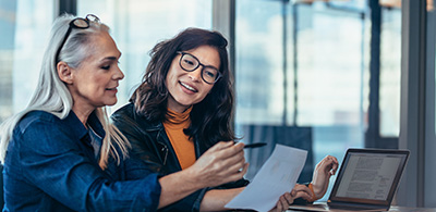 two people signing a legal document on a table representing business agreements and collaboration opportunities 4 important steps